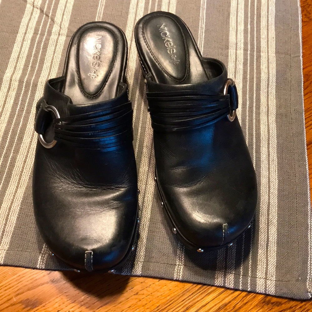 Black leather clogs